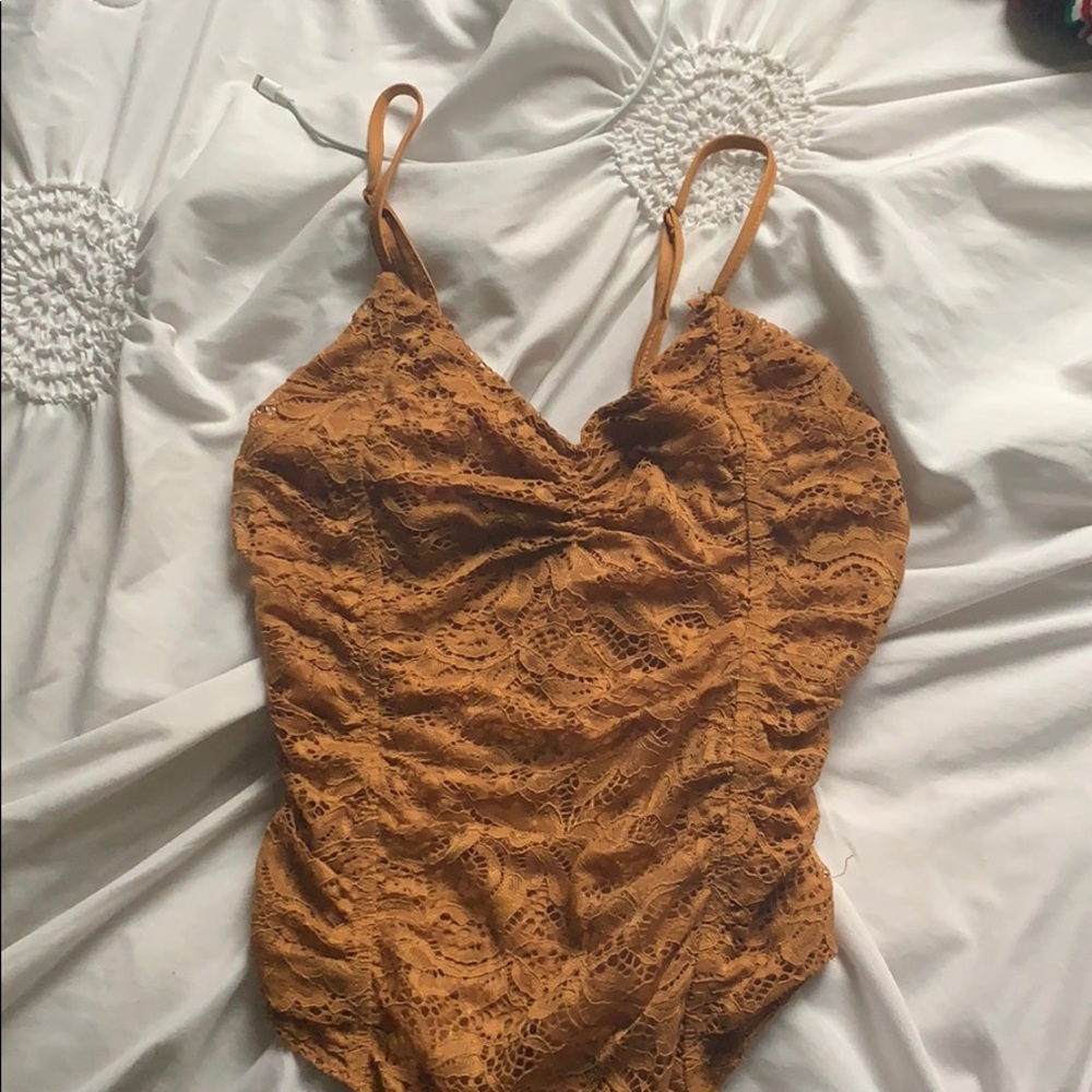 Cute bodysuit! New with tags Great for nights out